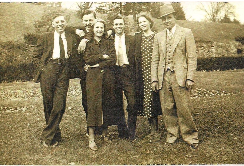 Photo Courtesy of Patricia McCarty‎ from Facebook Group The Lawrence Register December 27, 2017   The above picture of my father, Fred Thompson b. May 1915 in Waterloo, Lawrence Co. to Fletcher Alonzo Thompson and Serena Pearl Rodgers. The picture was taken in the late 1930s and he is the one in the middle of a group of people. I don't know where this was taken, maybe somewhere in Lawrence County, or who the other people are. If any of you recognize any of the people in the picture, please let me know. Fred later moved to Dayton, OH and lived there the rest of his life, but visited his family in Lawrence and Gallia Counties. 