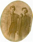 Photo courtesy of  Drena Arroyo 2011  posted on facebook group of The Lawrence Register The men in the picture are distant cousins. Sheridan Elmer Brumfield (1889-1969) and his father George B. Brumfield Jr (1860-1915) George married Mary Finch Dobbins 